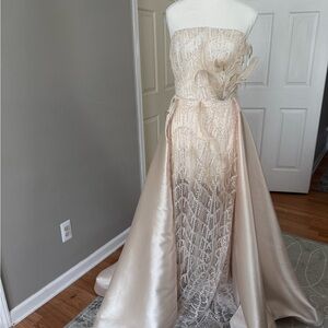 Elegant Strapless Gown Beaded with Feather Detail
